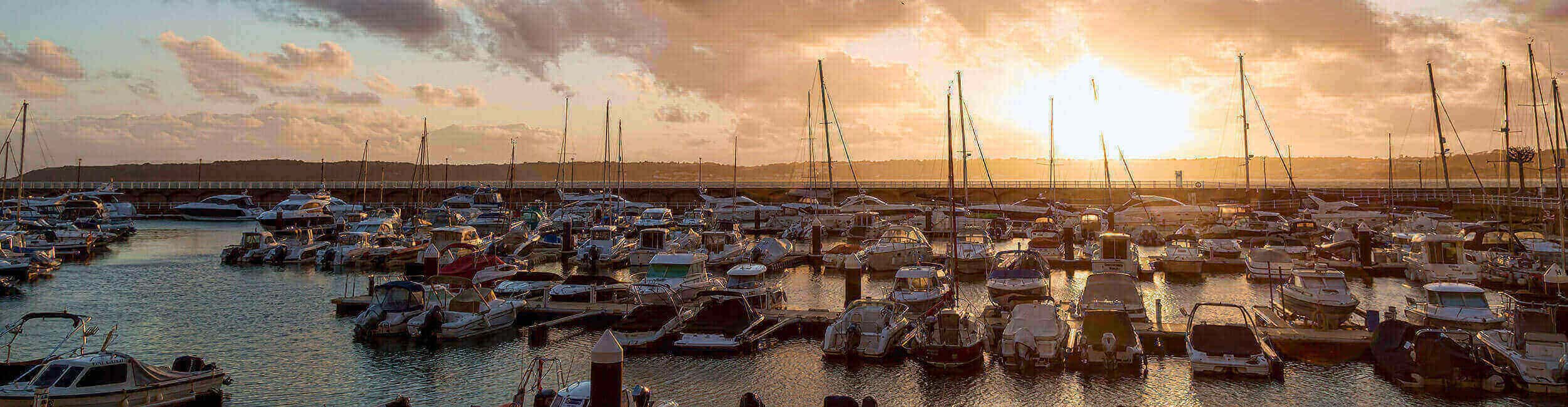 Sun setting over Jersey marina